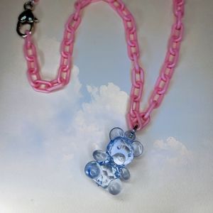 Blue Teddy Bear Pendant on a Pink chain.